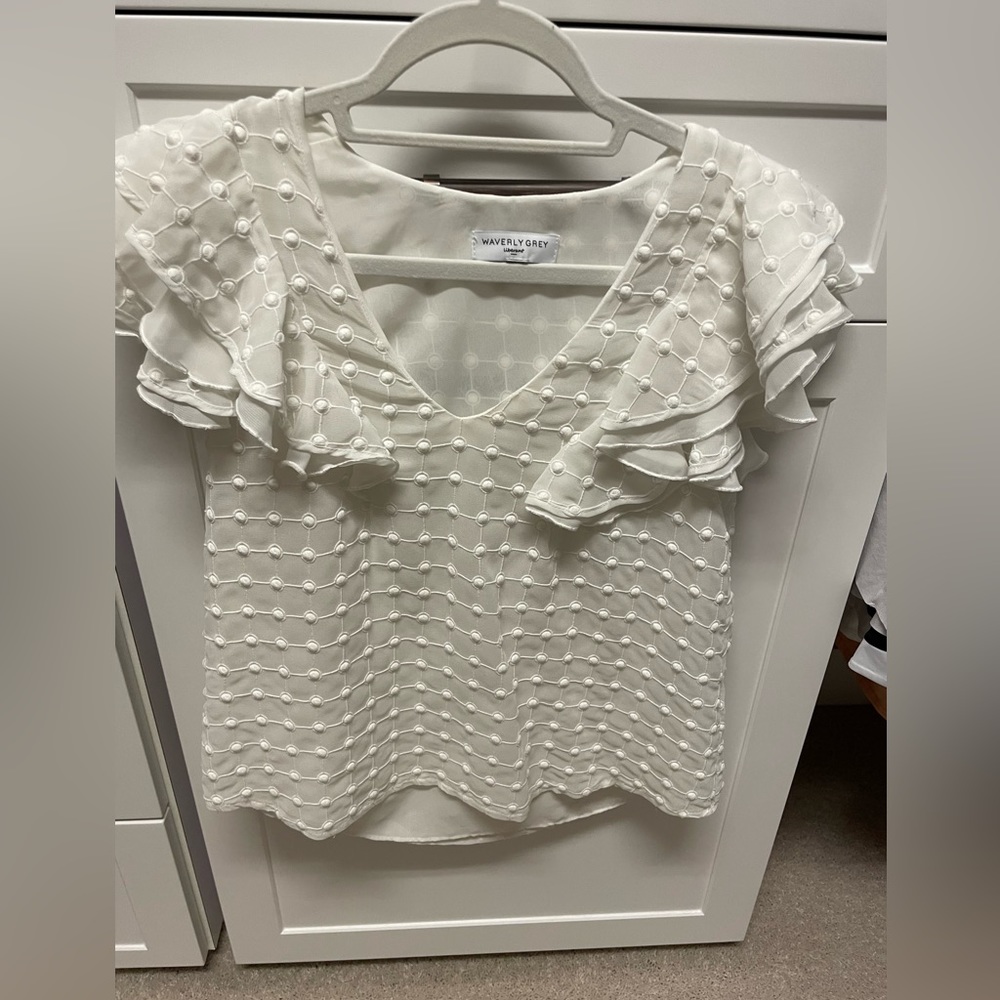 White shirt sleeve blouse with beautiful ruffle